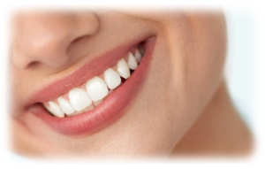 A young woman smiling thanks to cosmetic bonding treatment in Miami Springs.