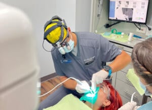 A Springs Dental patient being examined for tooth colored fillings.